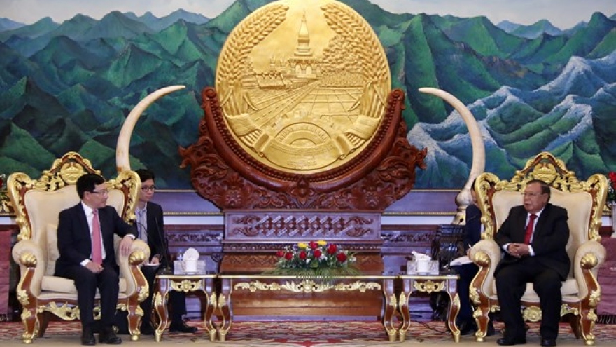 Deputy PM Pham Binh Minh meets Lao top leaders